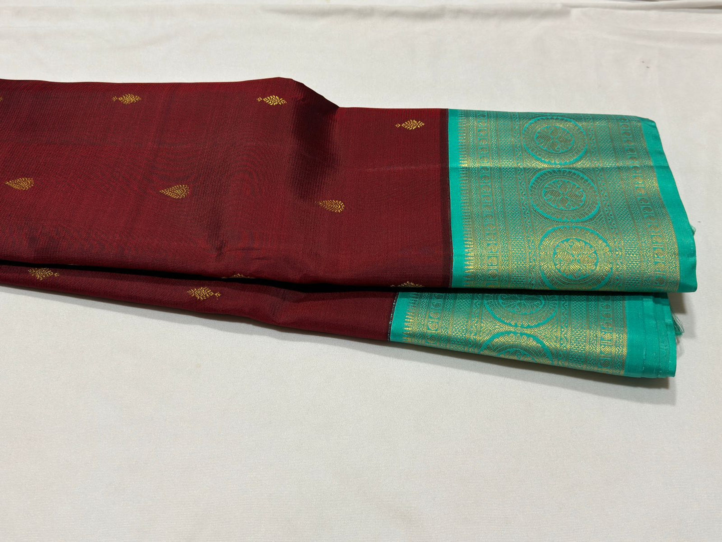 Maroon with acqua blue buttas korvai