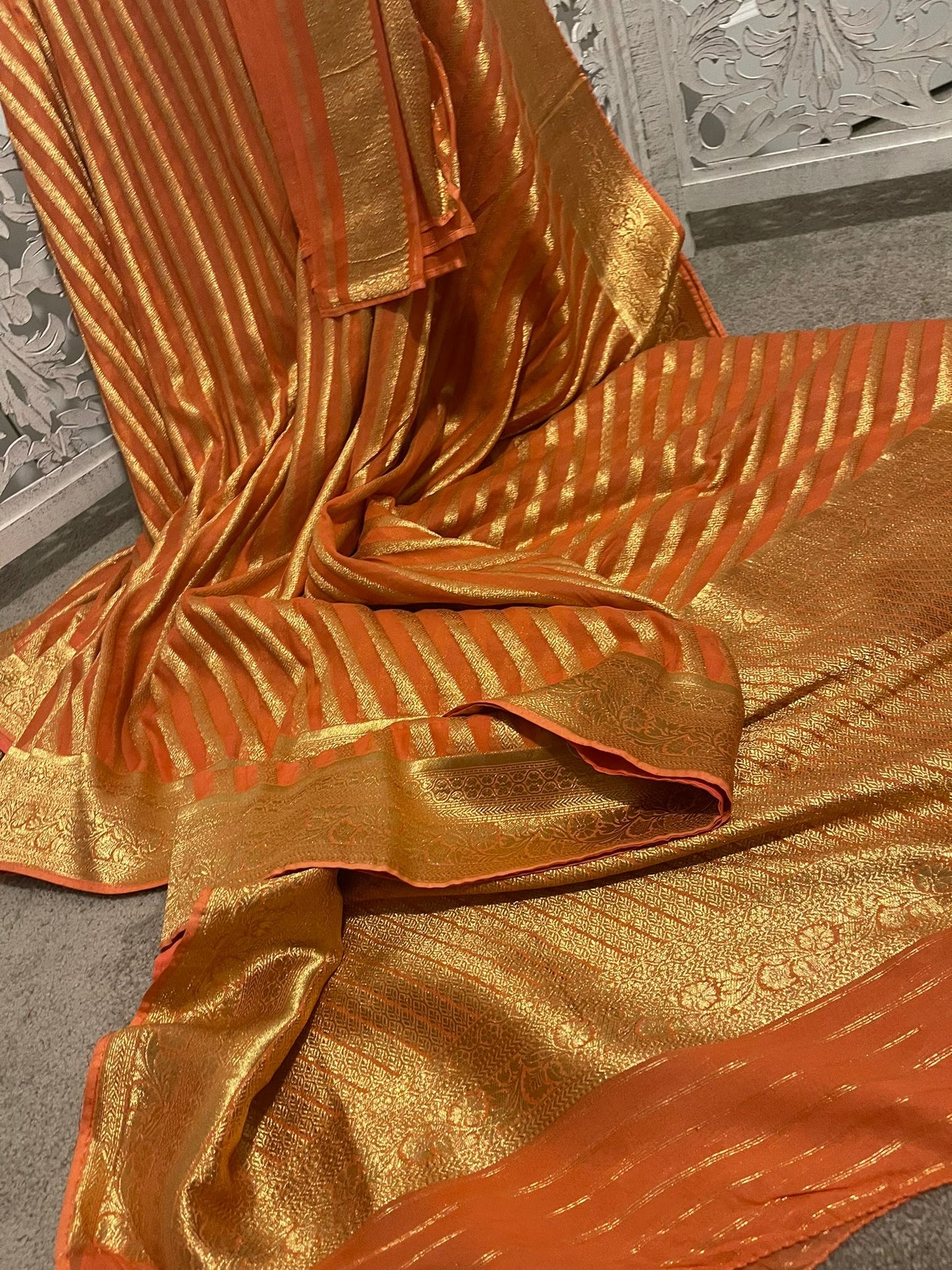 Orange / rust leheriya design Khaddi Georgette