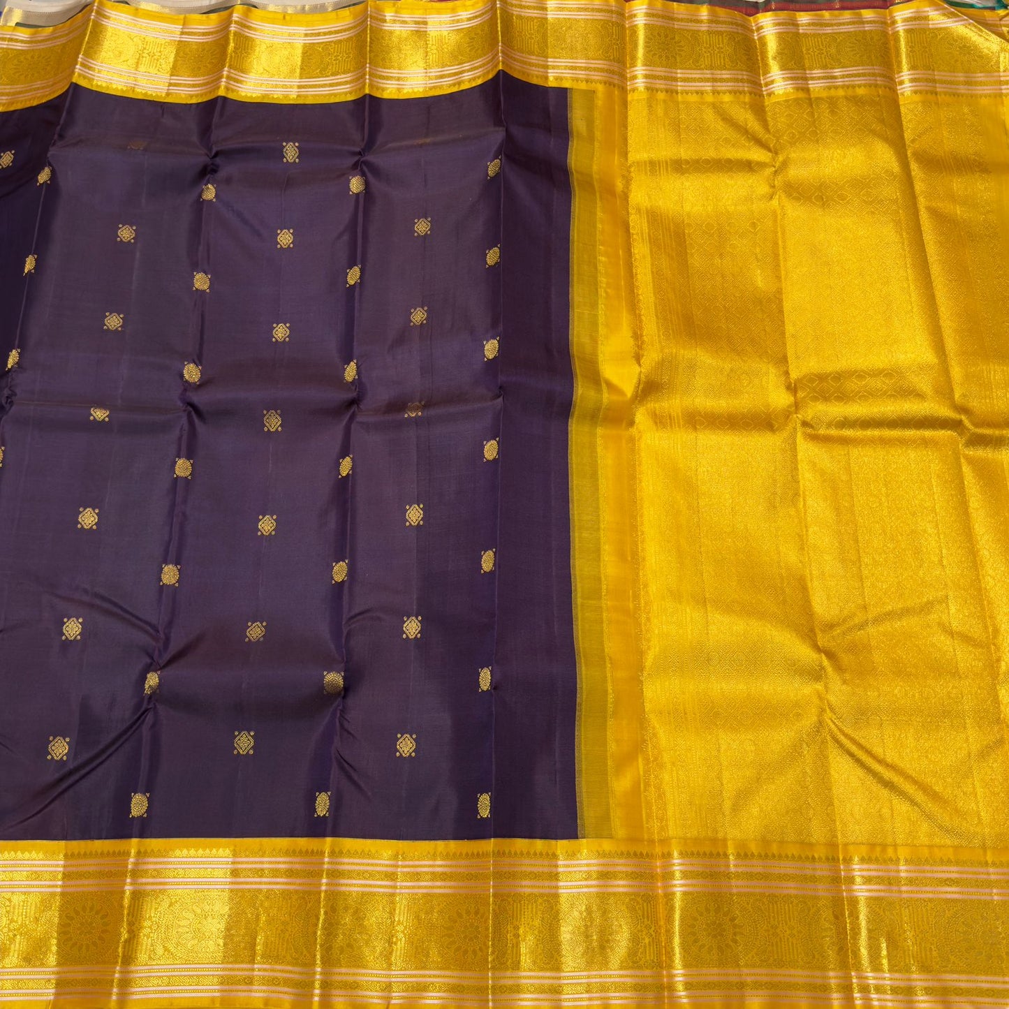 Brownish Maroon with golden yellow buttas korvai