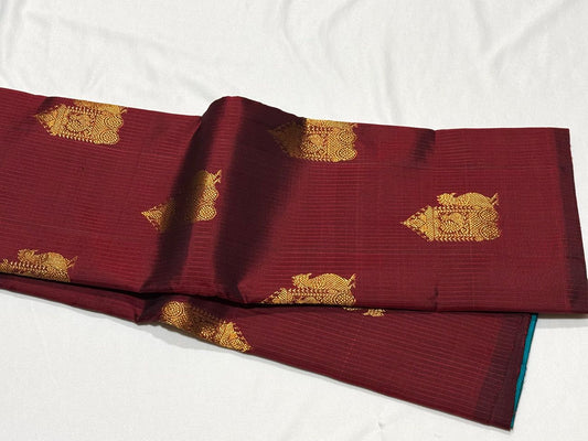 Dark Maroon/Peacock blue muthukattampeacock/Chariot buttas