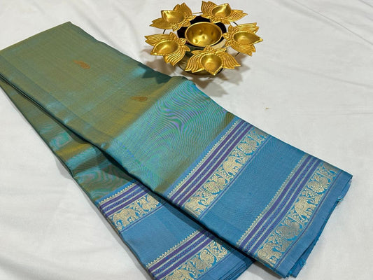 Pastel blue green/light blue elephant thodar motiffs