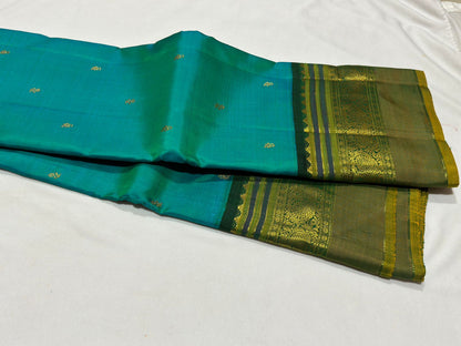 Peacock green with bottle green buttas korvai