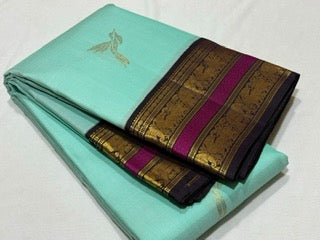 Aqua blue with blackish purple