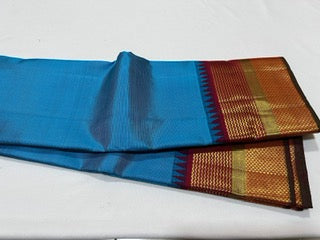 Aananda blue with maroon temple border