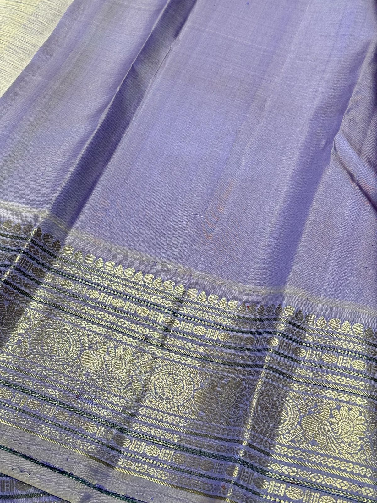 Deep brown with lavender buttas korvai
