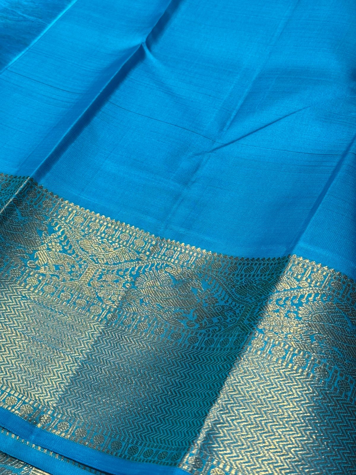 Orange / Copper sulphate blue korvai
