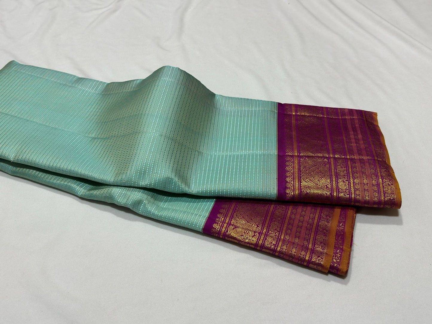 Aqua blue with deep violetish majenta