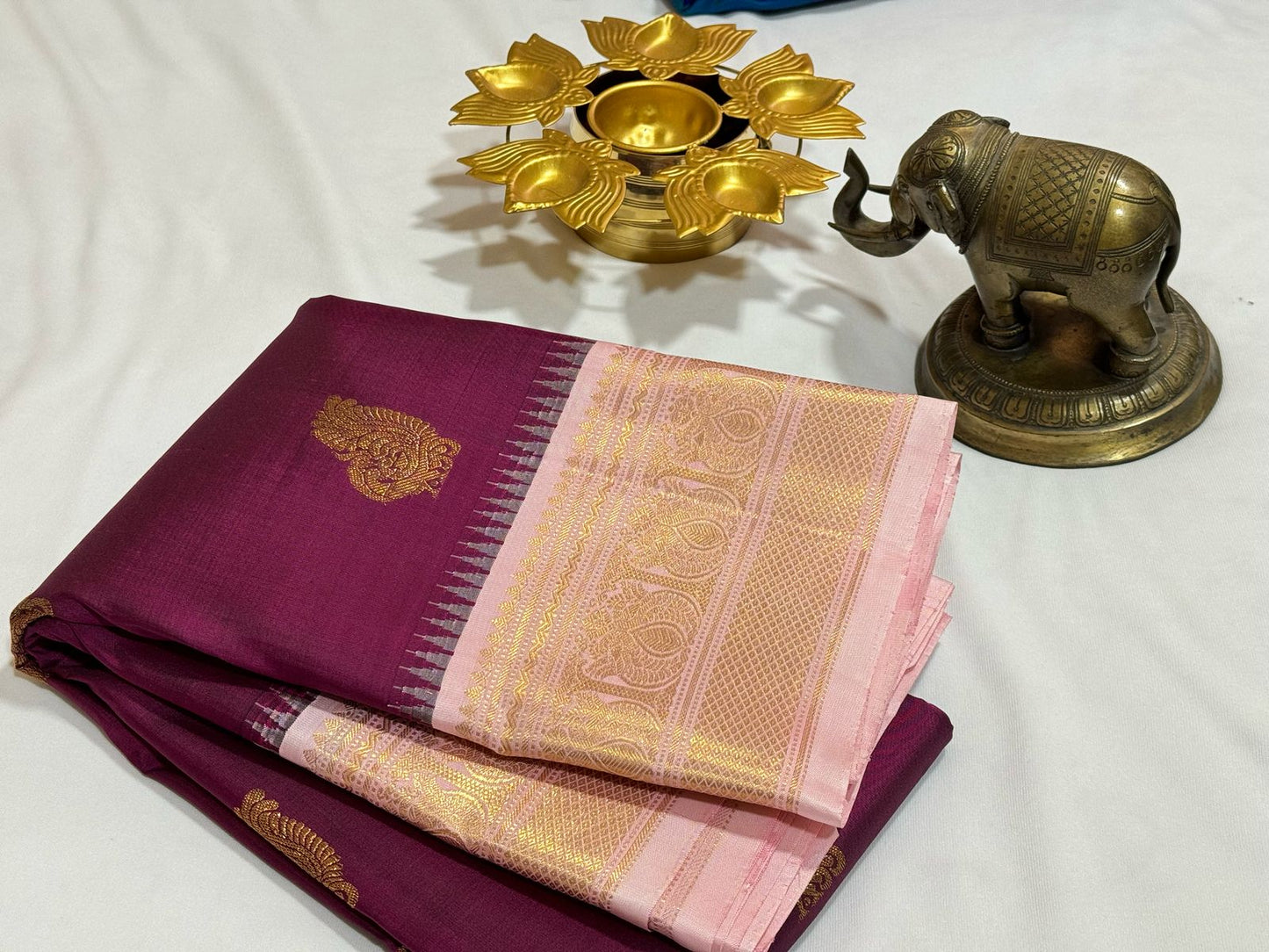Deep kungumam maroonish wine buttas korvai