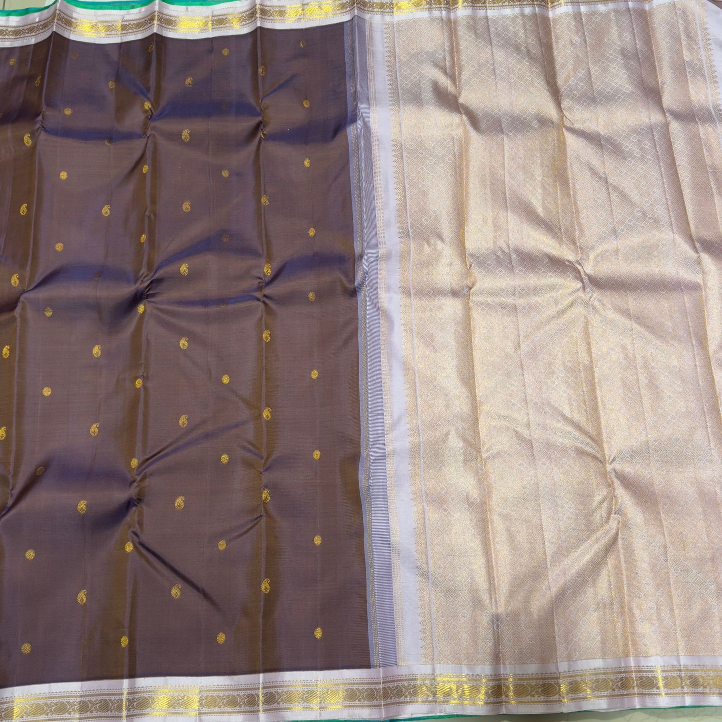 Dual tone brown with soft pastel creamish pink shade with buttas korvai