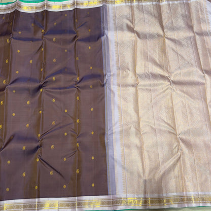 Dual tone brown with soft pastel creamish pink shade with buttas korvai