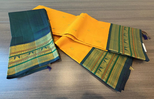 Turmeric yellow / peacock blue varisaipet border buttas korvai