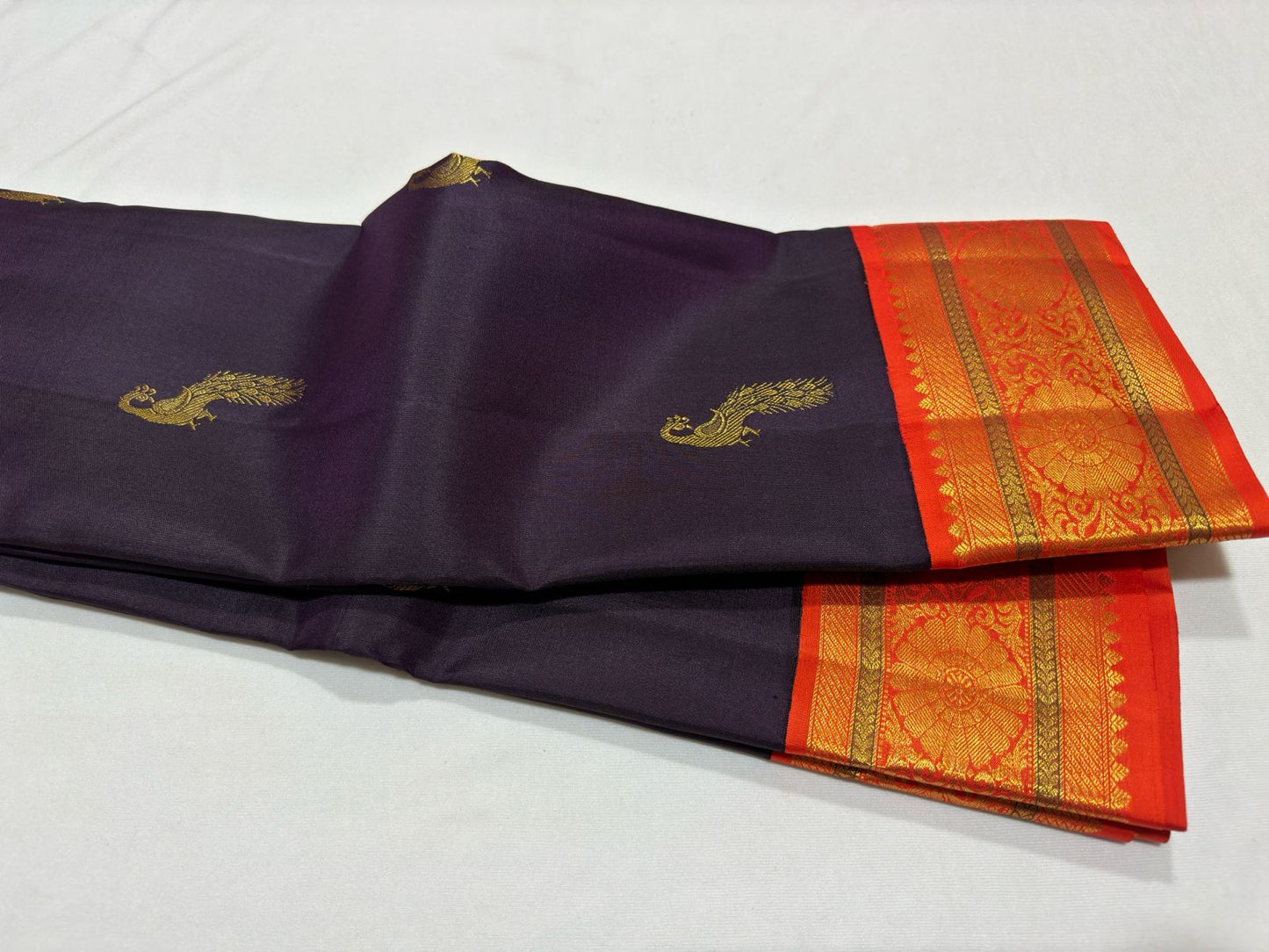 Dark coffee brown with orange peacock motiffs korvai