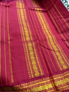 Karuneelam Red Green Ganga Jamuna plus thread buttas korvai