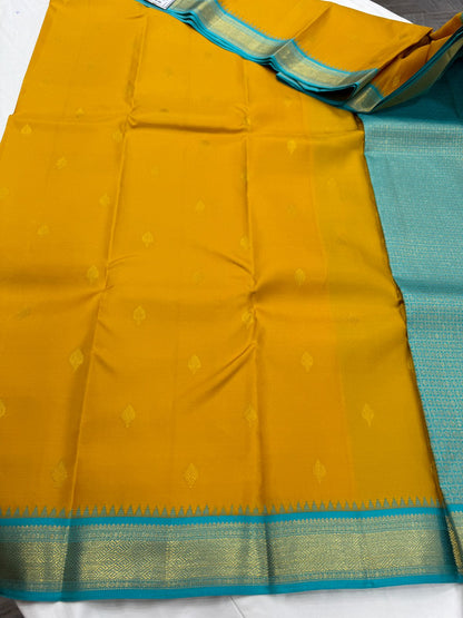 Dual tone mustard / teal buttas korvai