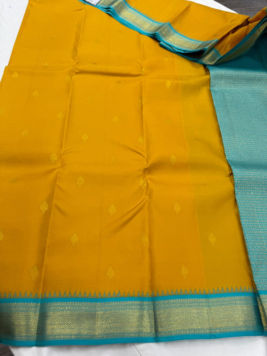Dual tone mustard / teal buttas korvai