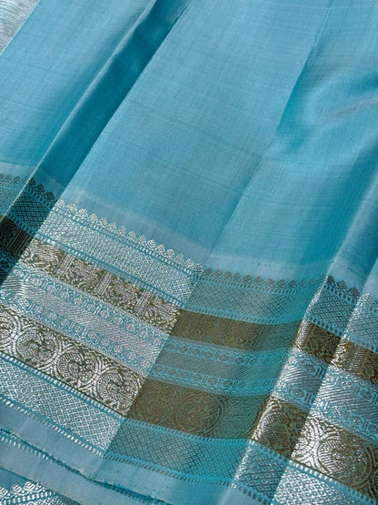 Red with powder blue buttas korvai