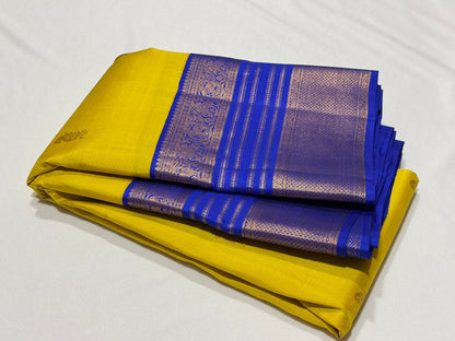 Yellow / royal blue buttas korvai