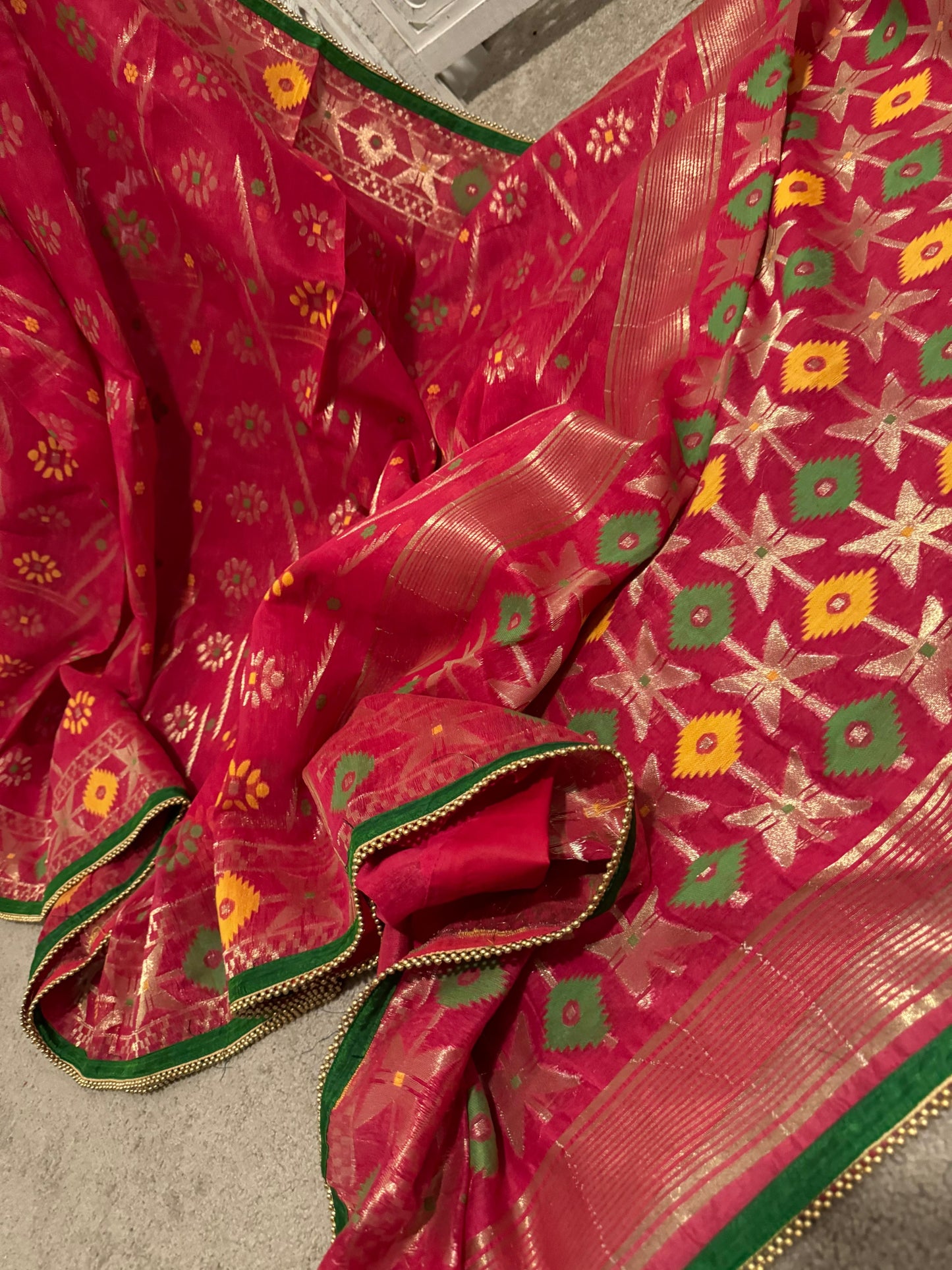 Red designer Jamdhani with gold balls