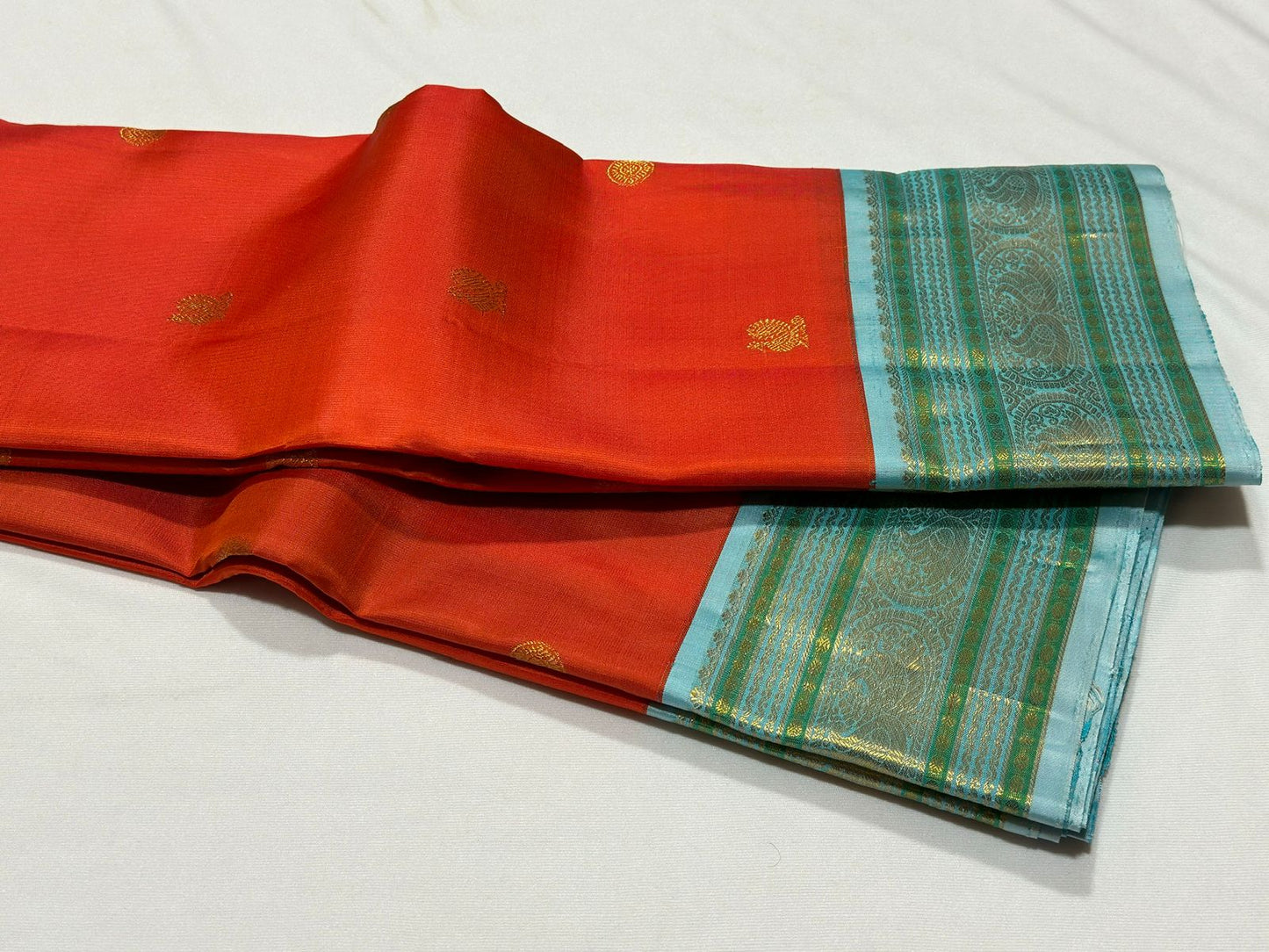 Orange with powder blue Minakari work