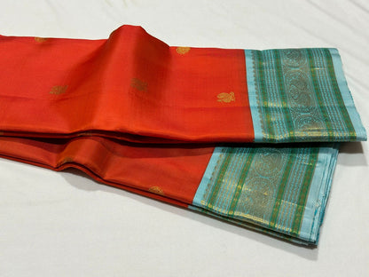 Orange with powder blue Minakari work