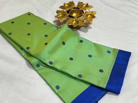 Mint green with royal blue buttas