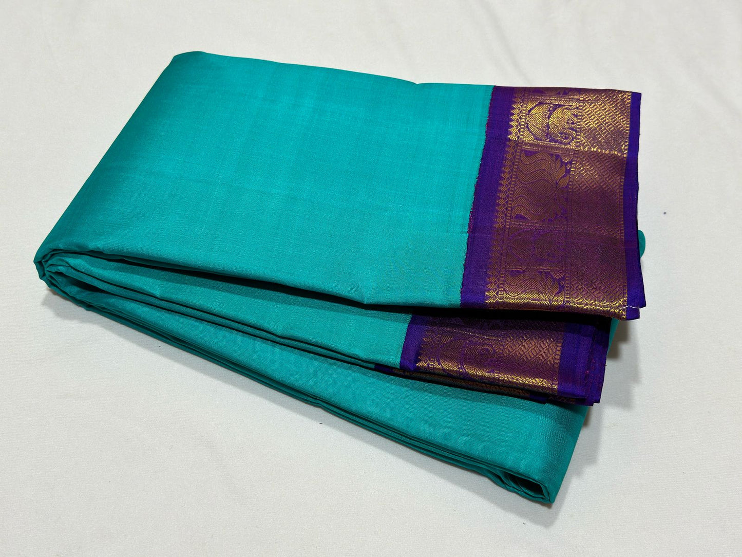 Turquoise blue with violet korvai